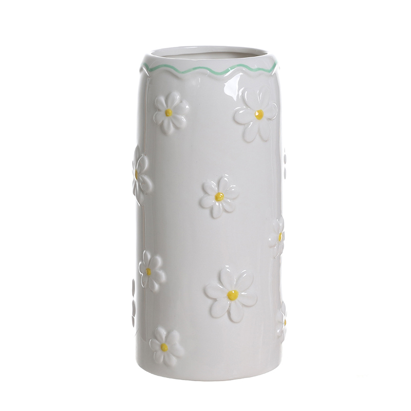 White flower-shaped ceramic vase