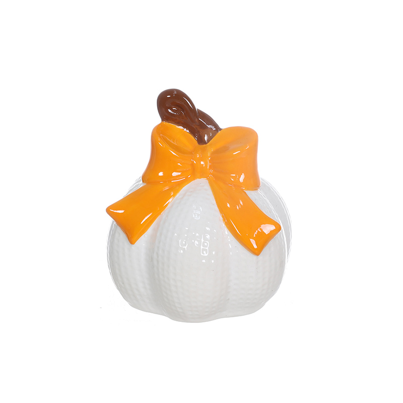 Harvest festival pumpkin decoration with a bow