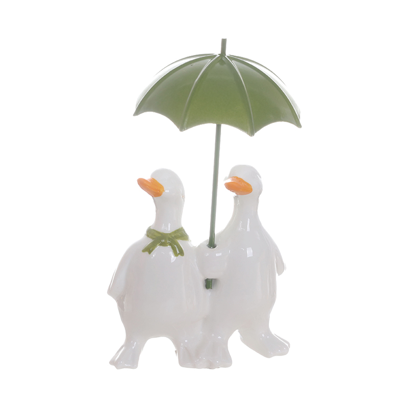 White Duck Holding Green Umbrella